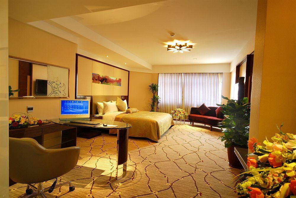 Inzone Garland Hotel Jün-nan Pokoj fotografie